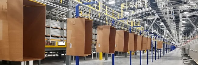 Conveyco Overhead Trolley Conveyor vs AGVs